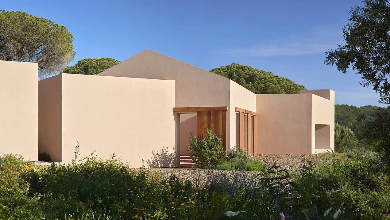 Modern exterior of Cá na Serra holiday rental in Melides, Portugal with minimalist architecture and natural surroundings