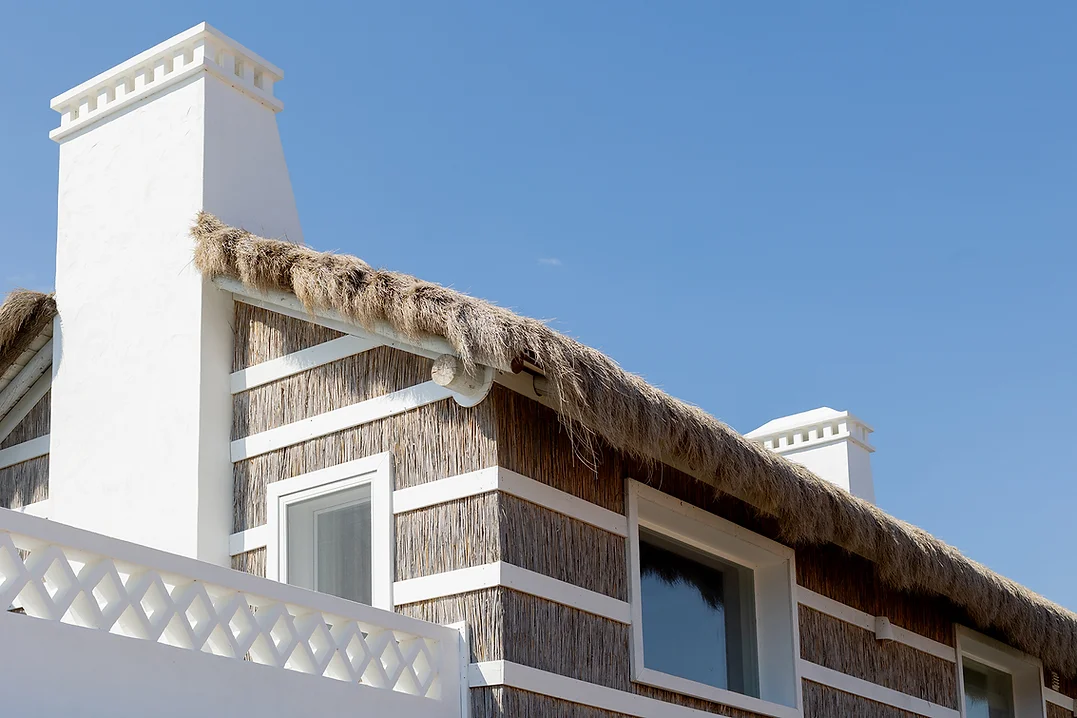 Thatched roof detail and chimneys on Rafter Comporta Celeste holiday rental in Comporta, Portugal